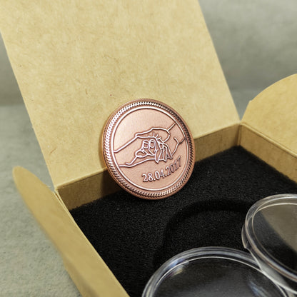 Handcrafted copper anniversary coin standing in a craft gift box, showcasing the 32mm diameter and professional deep laser etching.