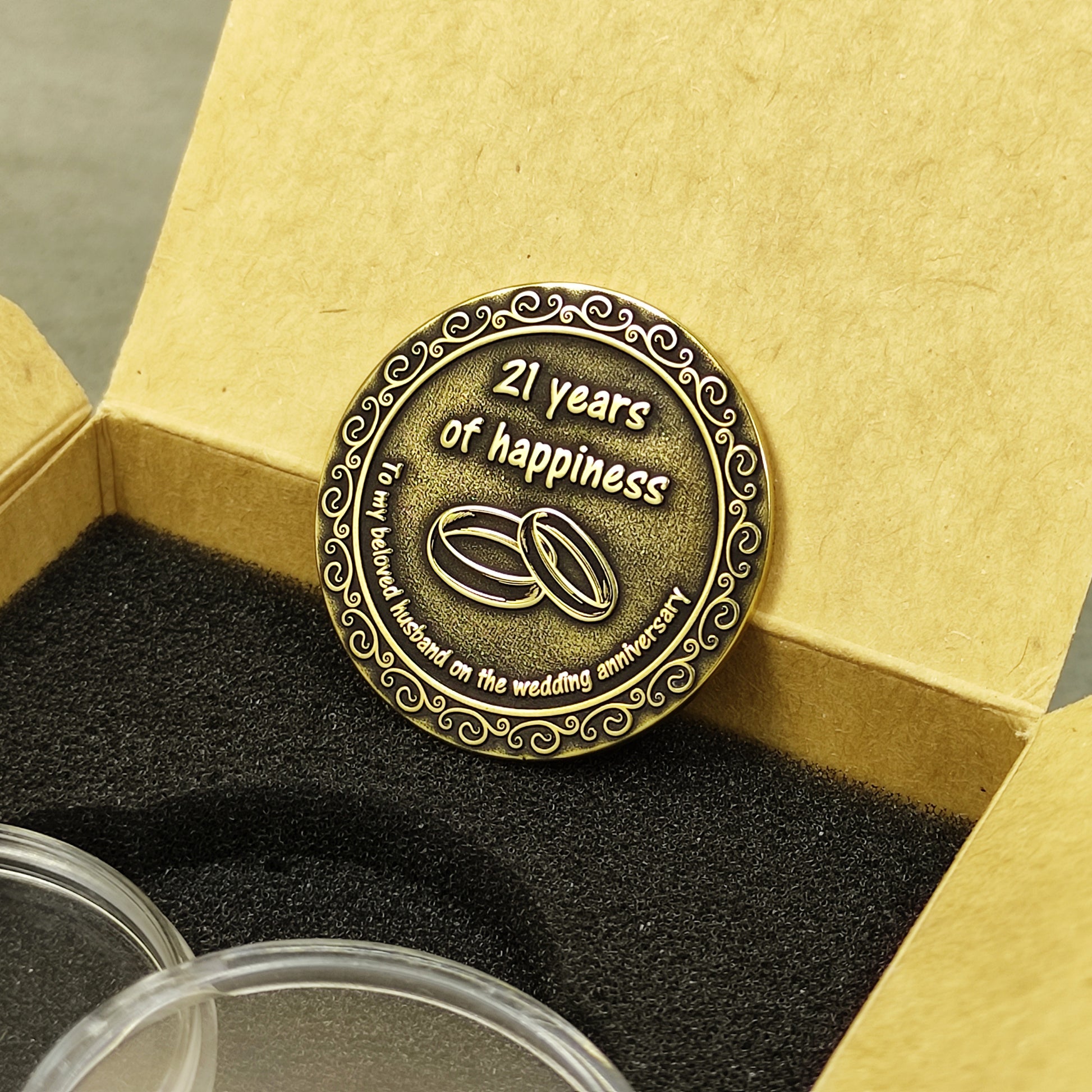 Handmade brass anniversary souvenir coin for husband placed in a stylish gift box with black foam insert, 21st wedding anniversary gift.