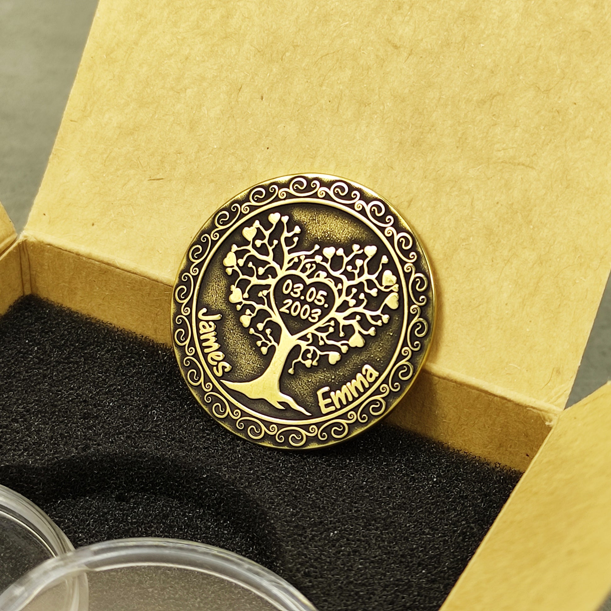 Hand-finished brass anniversary token with decorative swirl border, romantic personalized gift for her or him in a gift box.