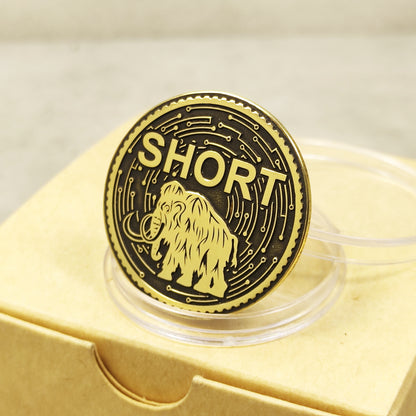 Reverse side of polished brass coin featuring "SHORT" engraving and intricate circuit-style background pattern.