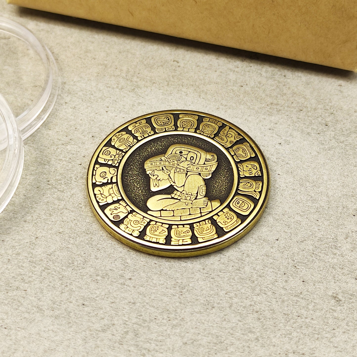 Personalized Mayan mythology brass token, 32mm diameter, handcrafted ancient calendar replica with precision etched details.