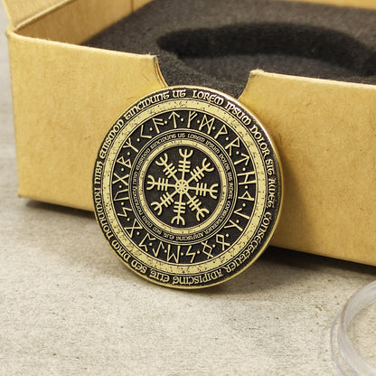 Brass Viking compass amulet with runic circle, handcrafted metal coin with aged patina finish.