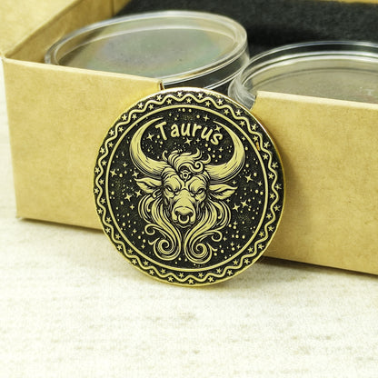 Taurus zodiac brass medal presented with minimalist gift packaging, showcasing the 32mm diameter and premium metal quality of the custom engraved coin.
