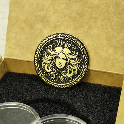 Custom Virgo zodiac brass coin in a premium gift box with black foam insert, highlighting the gold-tone brass material and dark engraved details.