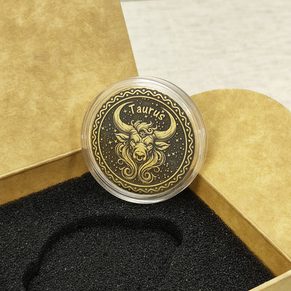Top view of the Taurus zodiac medal in a protective acrylic capsule, handcrafted brass coin gift for astrology lovers with personalized laser etching.