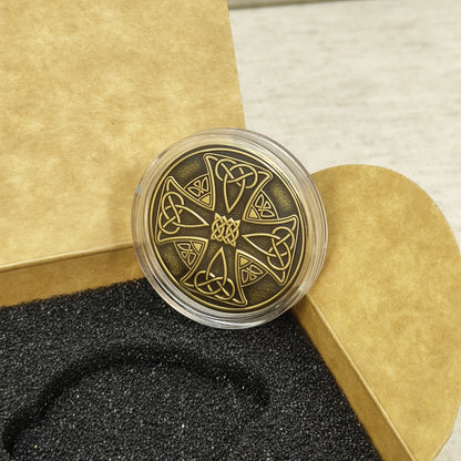 Handmade brass Celtic coin in a premium craft gift box, detailed Norse and Celtic knotwork art.