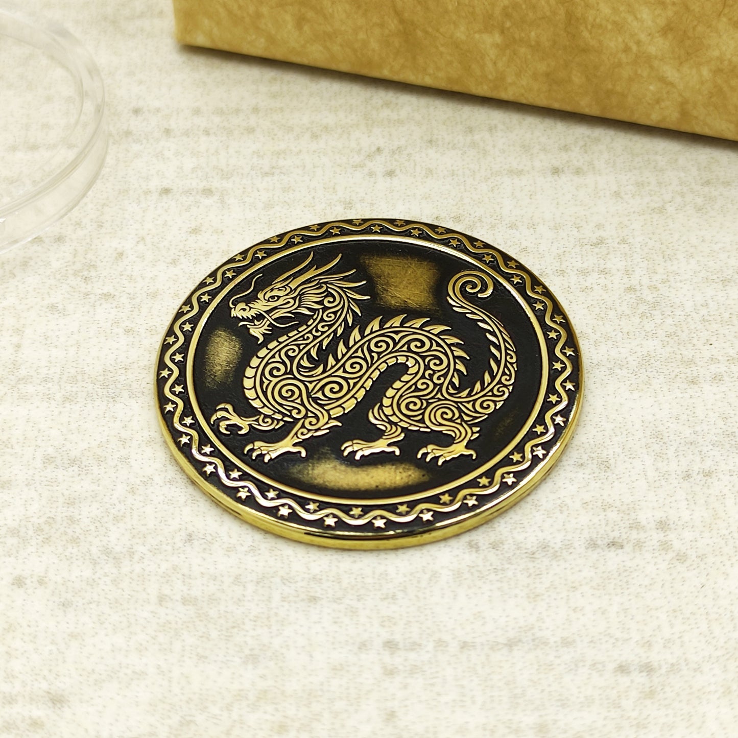 Detailed view of the brass Dragon zodiac coin with 3D-style floral patterns, showcasing the 32mm diameter and professional deep laser etching.