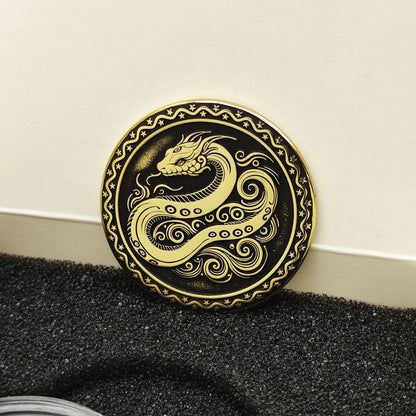 Vertical view of the personalized brass zodiac medal in a premium black insert box, showcasing the antique finish and engraved zodiac details.