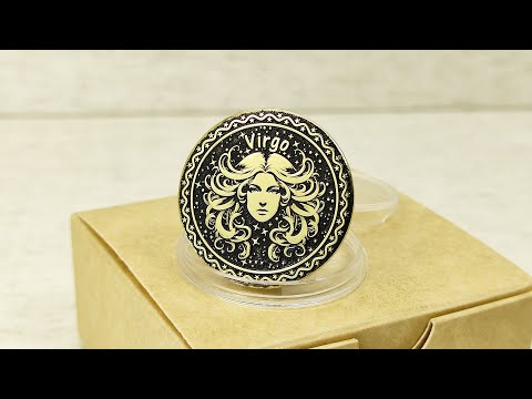 Personalized brass Virgo zodiac coin placed on a craft gift box, showcasing the durable metal texture and high-contrast professional patina treatment.