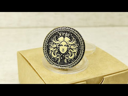 Personalized brass Virgo zodiac coin placed on a craft gift box, showcasing the durable metal texture and high-contrast professional patina treatment.