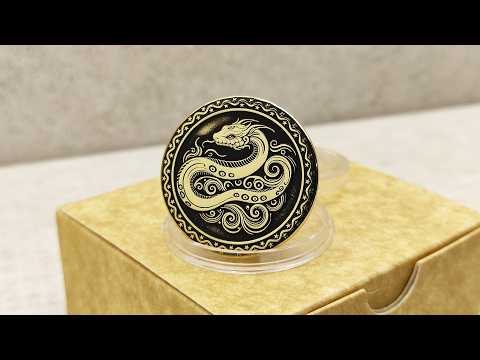 Video showcase of a personalized brass zodiac coin Year of the Snake, highlighting the metallic gold-tone texture and high-contrast professional patina.